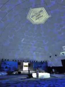 interior of geodesic dome tent with light projections