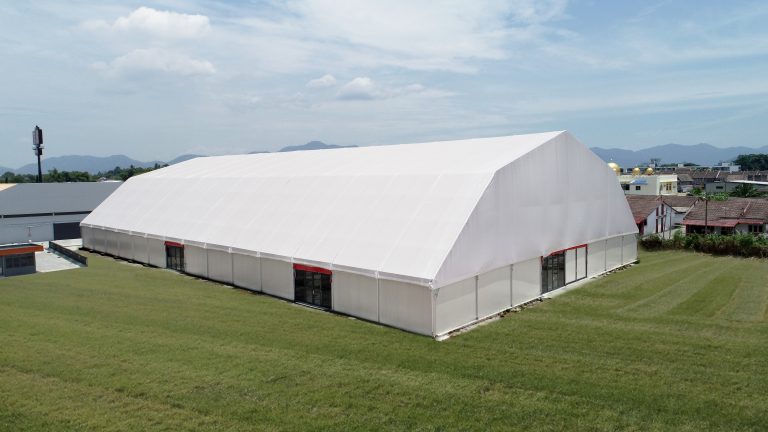 Canopy tent of Gunung Rapat Convention Hall (GRC Hall) on green grass